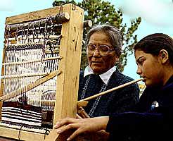 Granddaughter Learns to Weave Navajo Rugs from Elder